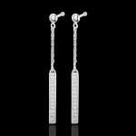 Boucles d'oreilles parisiennes or blanc 18 carats et diamants