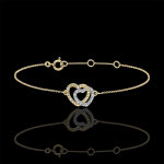 Bracelet coeurs complices - or blanc et or jaune 9 carats et diamants Bracelet coeurs complices - or blanc et or jaune 9 carats et diamants