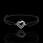 Bracelet coeurs enlacés or blanc 9 carats et diamants - cordon noir Bracelet coeurs enlacés or blanc 9 carats et diamants - cordon noir