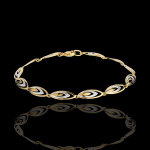 Bracelet plumes de ganga - or blanc et or jaune 18 carats Bracelet plumes de ganga - or blanc et or jaune 18 carats