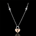 Collier prcieux secret - coeur - or blanc et or rose 9 carats