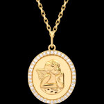 M�daille de bapt�me sertie ange musicien � or jaune 9 carats et diam