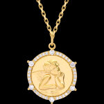 M�daille de bapt�me vierge marie sertie � or jaune 9 carats et diama