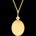 M�daille ovale sertie elodie � or jaune 9 carats et diamants de synt