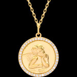 M�daille ronde sertie angelot �clair� � or jaune 9 carats et diaman