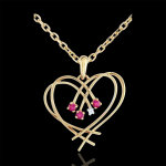 Pendentif coeur tincelles - diamant et rubis - or jaune 9 carats