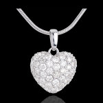Pendentif coeur pav or blanc 18 carats et belire (gm - 1. 04 carat -