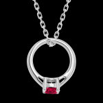 Pendentif 'cutie ring' - or blanc 9 carats et rubis synthtique
