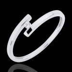 Solitaire nid pr�cieux - pur amour - or blanc 18 carats - diamant 0. 03