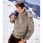 Le pull tricot chin� col roul�