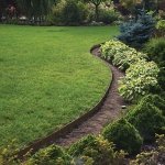Bordure de jardin flexible marron - 3, 8 cm x 10 m�tres avec 20 piquets d'ancrage